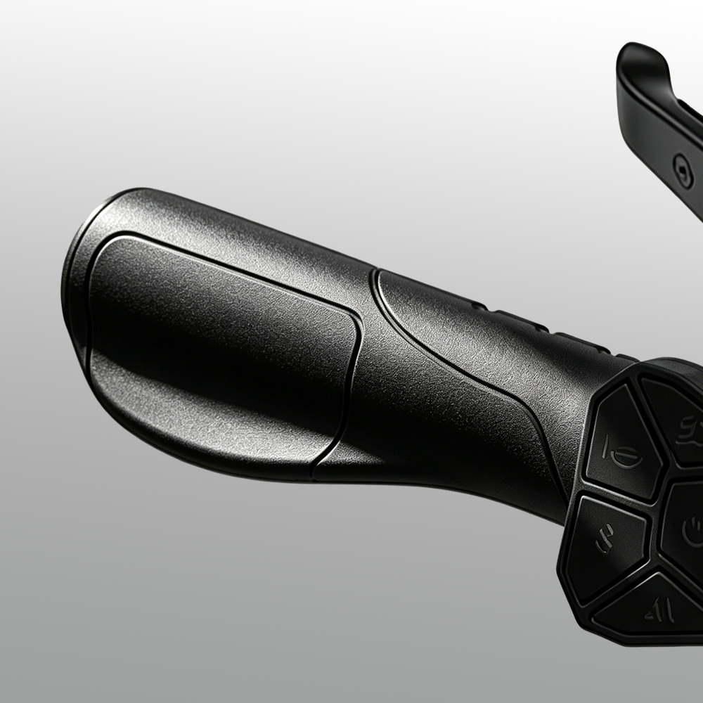 W9 Air handlebar grip with textured surface and integrated control buttons. The design highlights comfort, secure handling, and easy access to functions, making the grip a blend of ergonomics and smart usability.